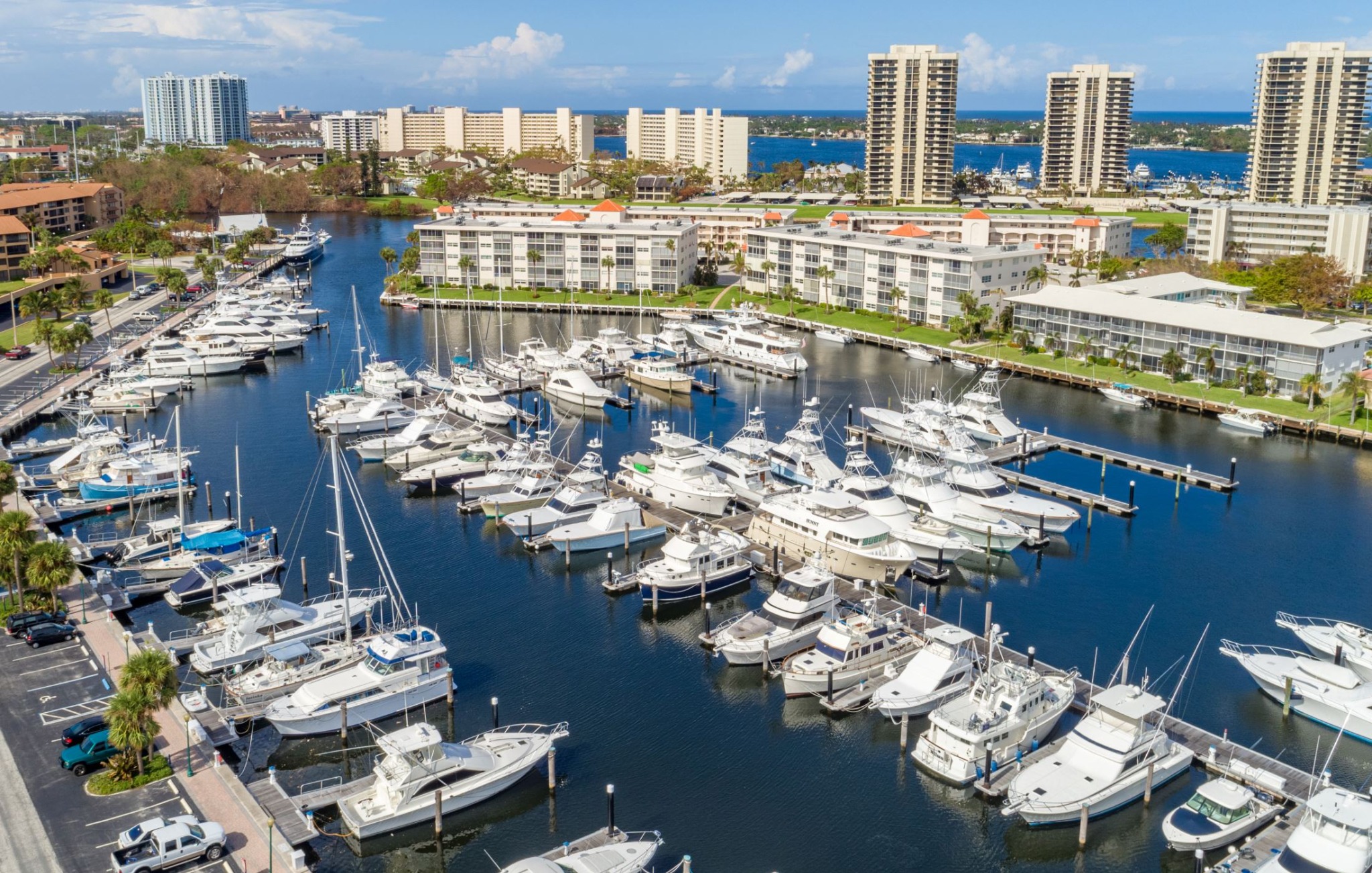 Marina, waterfront residences, and coastal skyline in the Palm Beaches